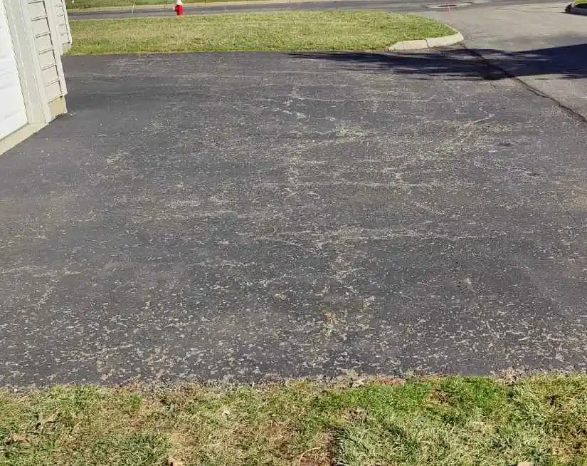 Clean and swept driveway after junk removal services.