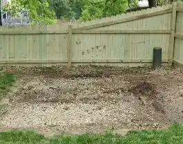 Area cleared of shed removal debris. 