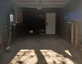 Garage cleared of clutter and debris.