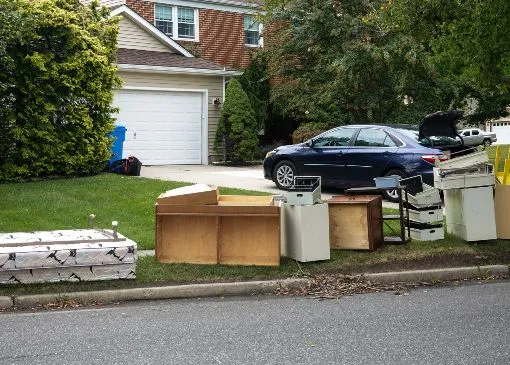 Junk on the curb in Columbus, Ohio awaiting pickup.