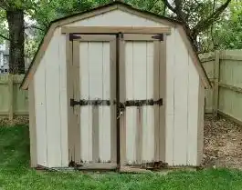 Wooden shed before junk shed removal.